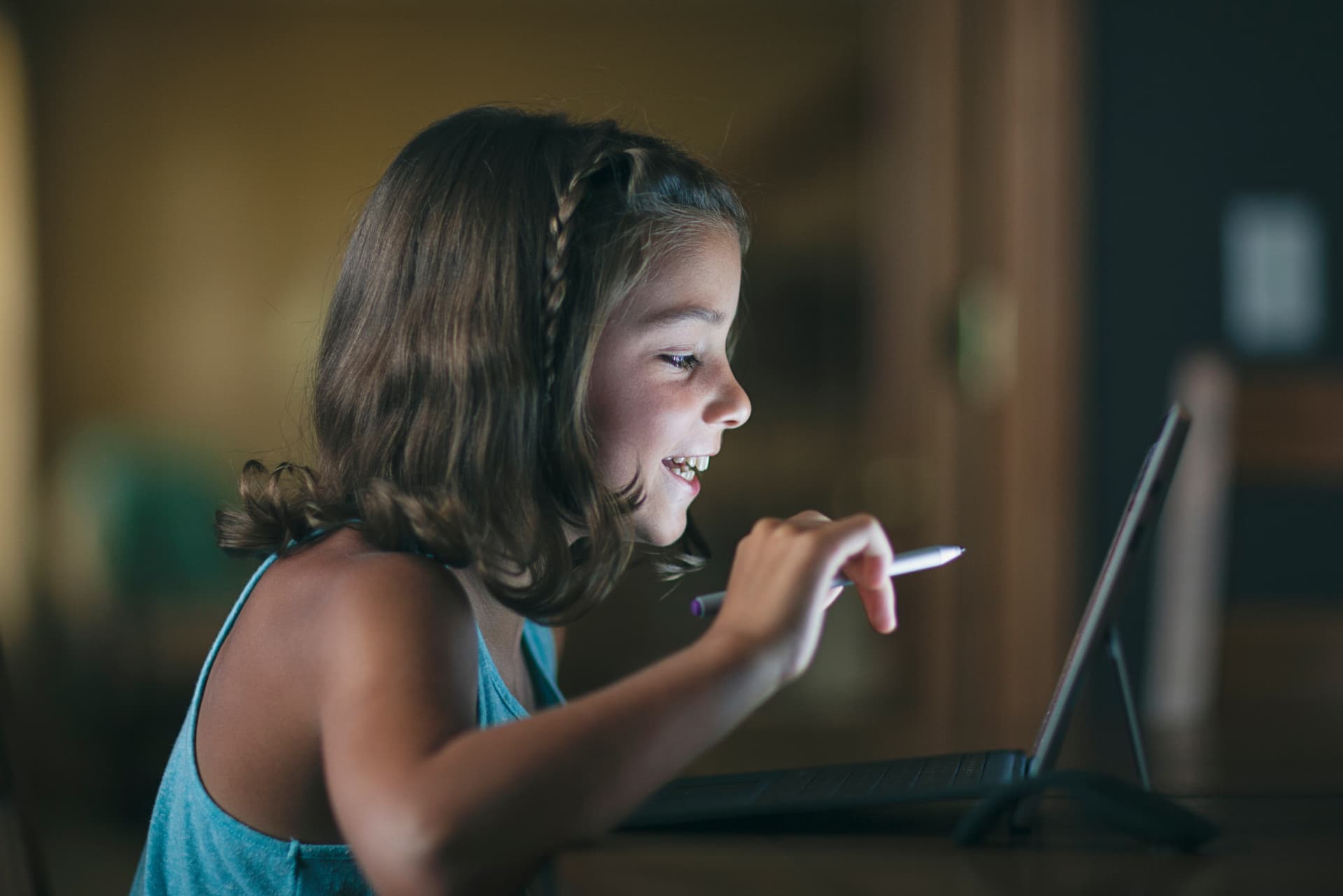 Girl learning to code on a next generation tablet
