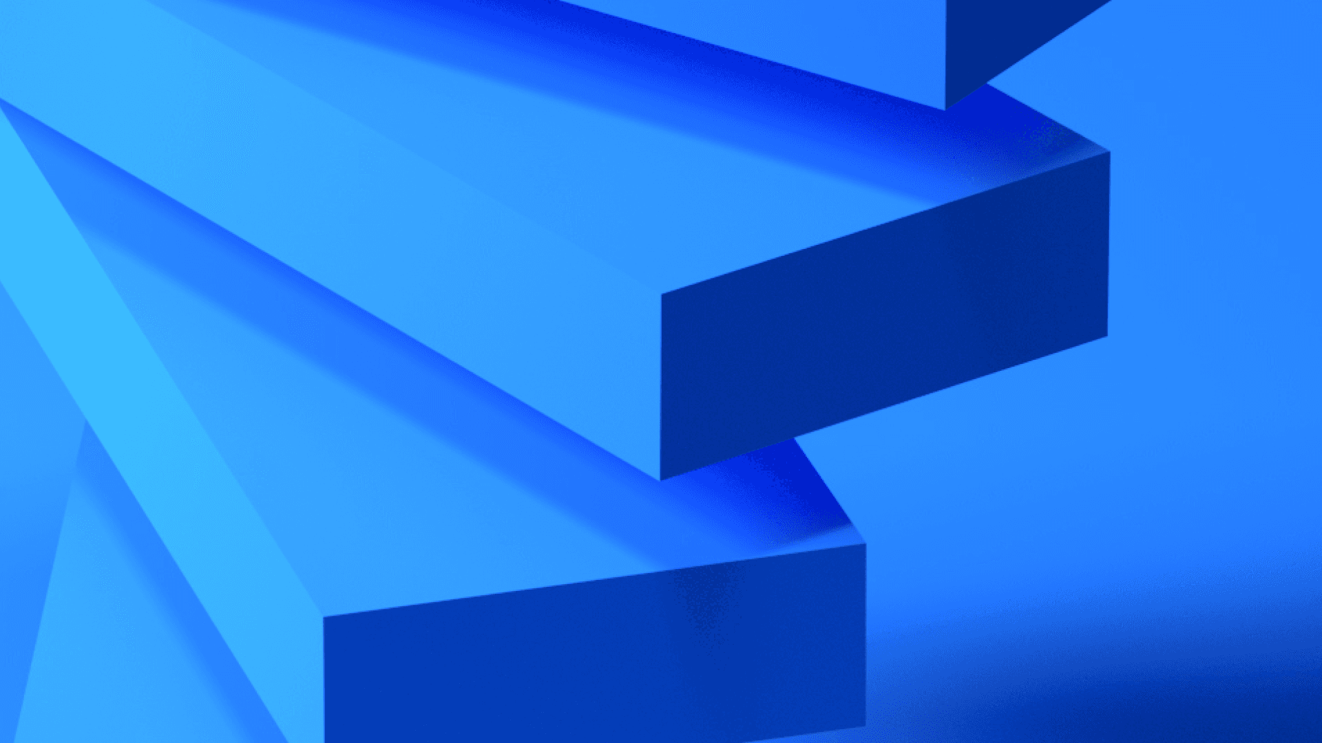 Rectangular blue blocks rest on top of one another and ascend up and to the right.