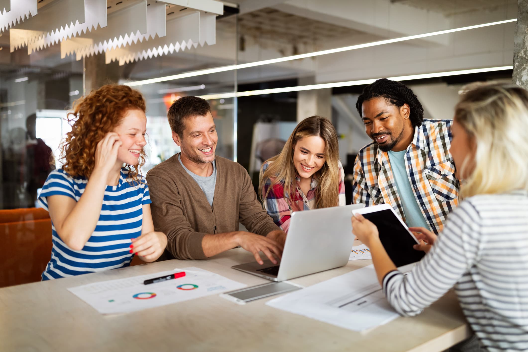A group of people having a meeting in an office