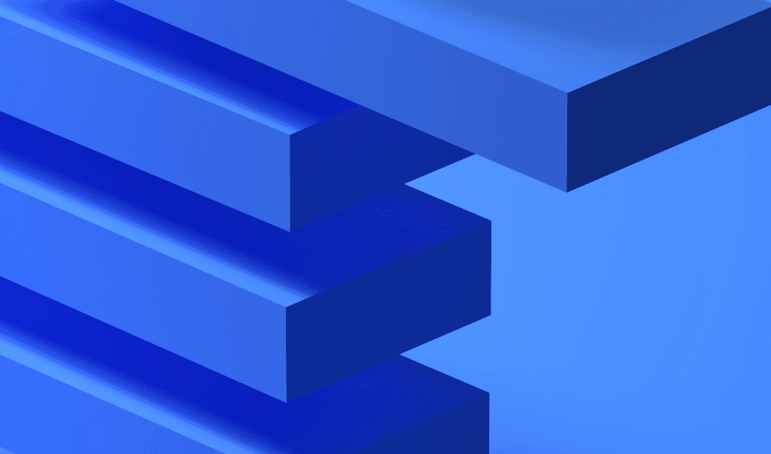 Four blue blocks stacked up in front of a lighter blue background